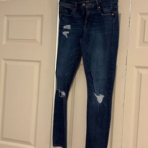 Distressed Blue Jeans